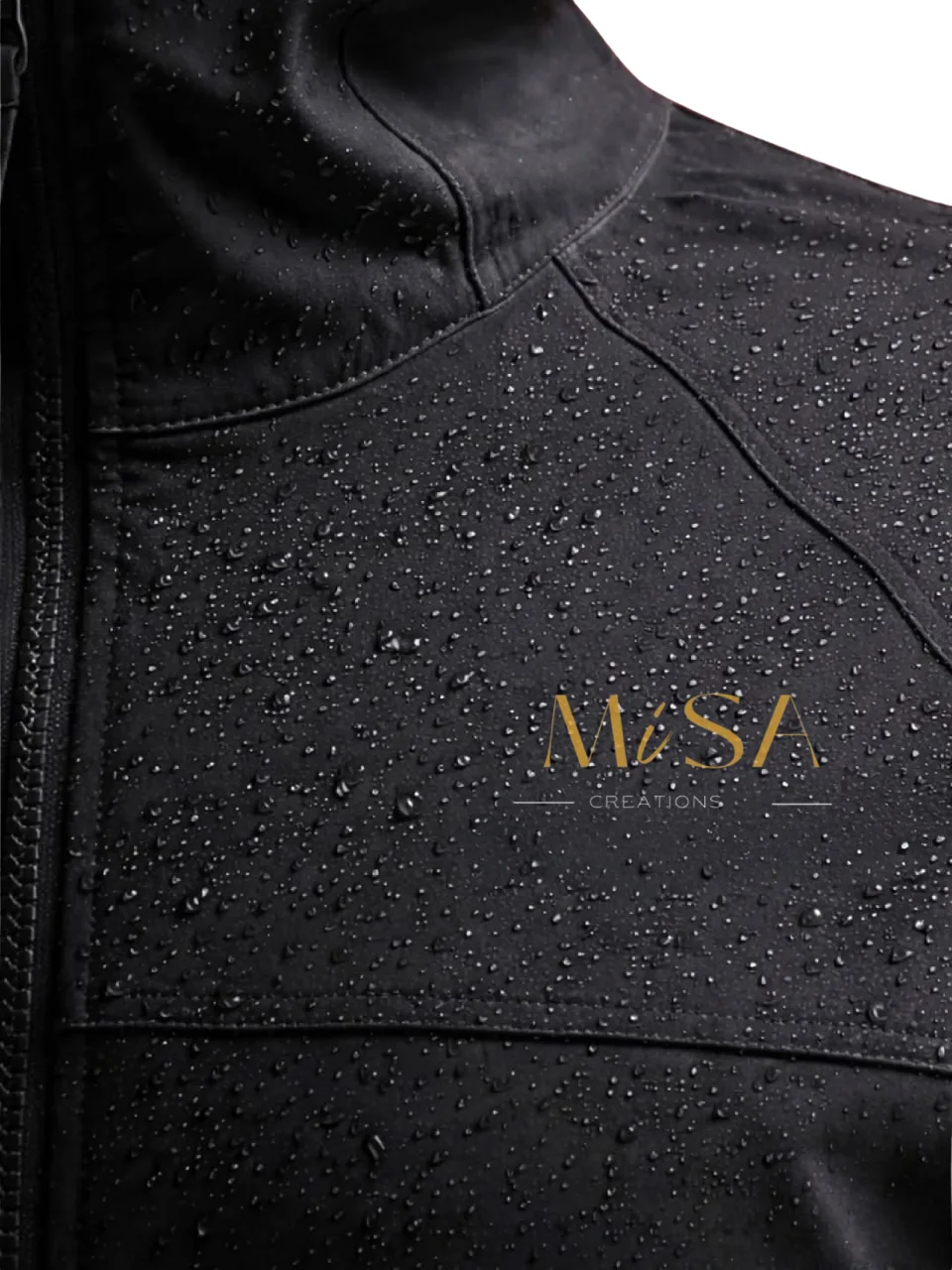 Water beading on a black MISA Creations performance jacket